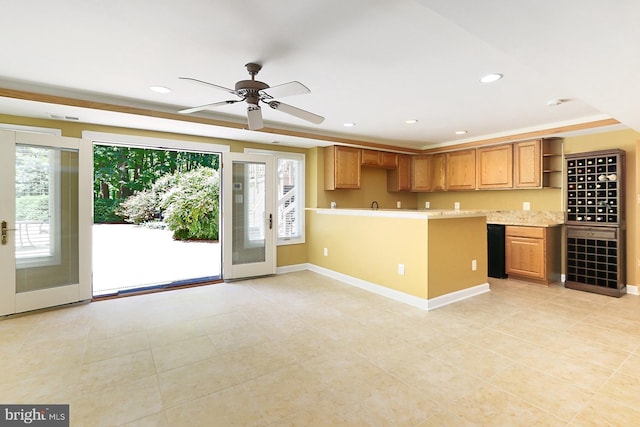 7808 Devereux Manor Ct, Fairfax Station, VA 22039 - kitchen with open shelves, light countertops, light tile patterned flooring, ceiling fan, and recessed lighting