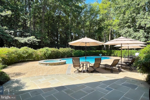 7808 Devereux Manor Ct, Fairfax Station, VA 22039 - view of pool with a patio and a pool with connected hot tub