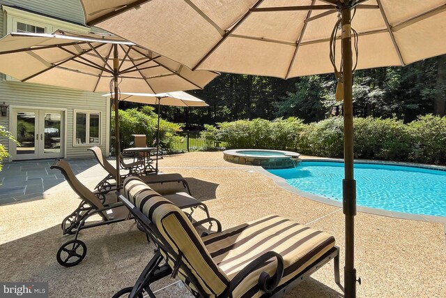 7808 Devereux Manor Ct, Fairfax Station, VA 22039 - view of swimming pool featuring french doors, a patio area, and a pool with connected hot tub