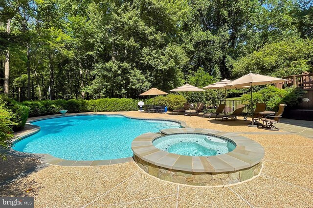7808 Devereux Manor Ct, Fairfax Station, VA 22039 - view of pool with a patio area and a pool with connected hot tub