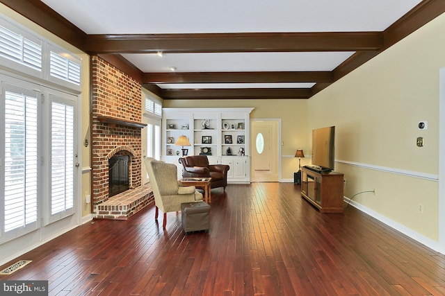7808 Devereux Manor Ct, Fairfax Station, VA 22039 - living area featuring beam ceiling, a fireplace, hardwood / wood-style floors, and baseboards