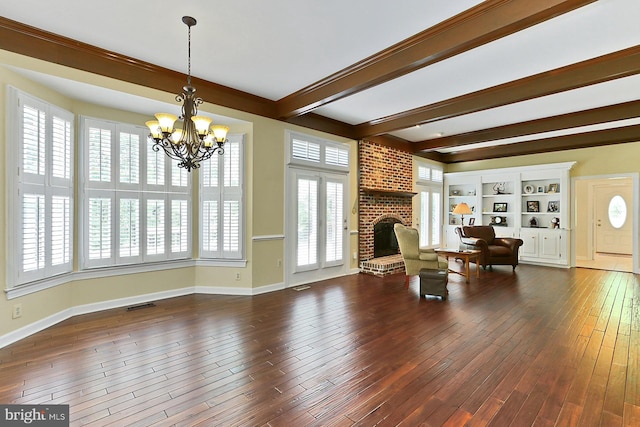 7808 Devereux Manor Ct, Fairfax Station, VA 22039 - living area with a chandelier, a brick fireplace, beam ceiling, baseboards, and dark wood finished floors