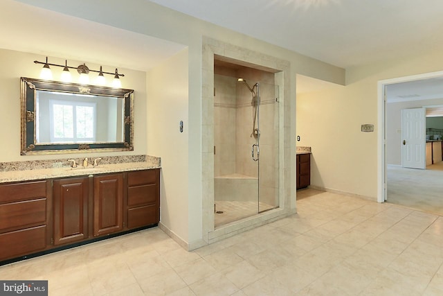 7808 Devereux Manor Ct, Fairfax Station, VA 22039 - bathroom featuring vanity, a shower stall, and baseboards