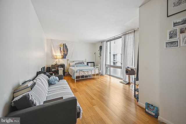 bedroom with wood finished floors
