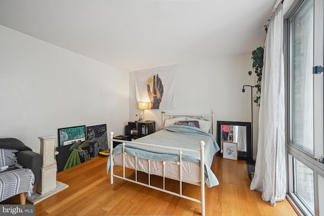bedroom featuring light wood-type flooring