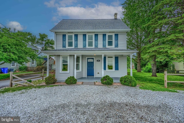 806 Frailey Rd, Emmitsburg, MD 21727 - view of front of house featuring covered porch, a chimney, fence, and a shingled roof
