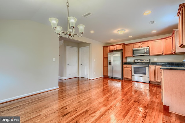 806 Frailey Rd, Emmitsburg, MD 21727 - kitchen featuring stainless steel appliances, dark countertops, light wood-style flooring, recessed lighting, and a chandelier