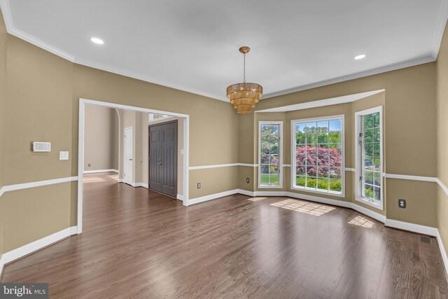 4 Stults Dr, Plainsboro, NJ 08536 - unfurnished dining area featuring baseboards, wood finished floors, a chandelier, crown molding, and recessed lighting