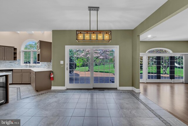4 Stults Dr, Plainsboro, NJ 08536 - unfurnished dining area with a sink, baseboards, and inlaid floor details