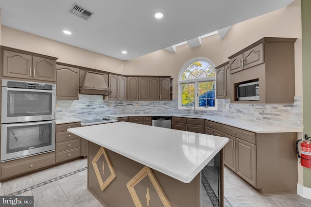 4 Stults Dr, Plainsboro, NJ 08536 - kitchen featuring premium range hood, appliances with stainless steel finishes, light countertops, a sink, and decorative backsplash
