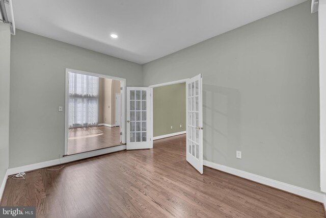 4 Stults Dr, Plainsboro, NJ 08536 - empty room featuring french doors, baseboards, wood finished floors, and recessed lighting