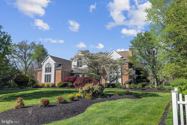 4 Stults Dr, Plainsboro, NJ 08536 - view of front of house featuring brick siding and a front yard