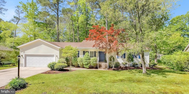 5 Mist Flower Rd, Ocean Pines, MD 21811 - view of front of property with driveway, an attached garage, and a front lawn
