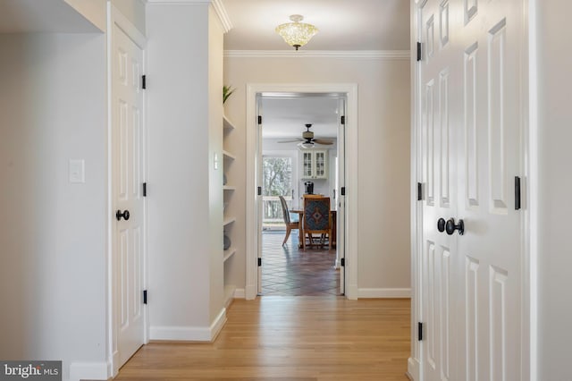 902 Emerald Dr, Alexandria, VA 22308 - corridor with baseboards, light wood-type flooring, and ornamental molding