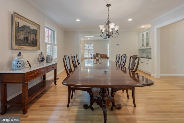 902 Emerald Dr, Alexandria, VA 22308 - dining area with a chandelier, ornamental molding, light wood-type flooring, baseboards, and recessed lighting