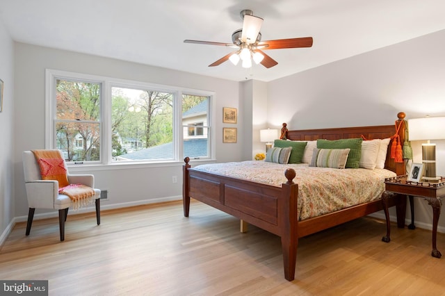 902 Emerald Dr, Alexandria, VA 22308 - bedroom with light wood-type flooring, baseboards, and a ceiling fan