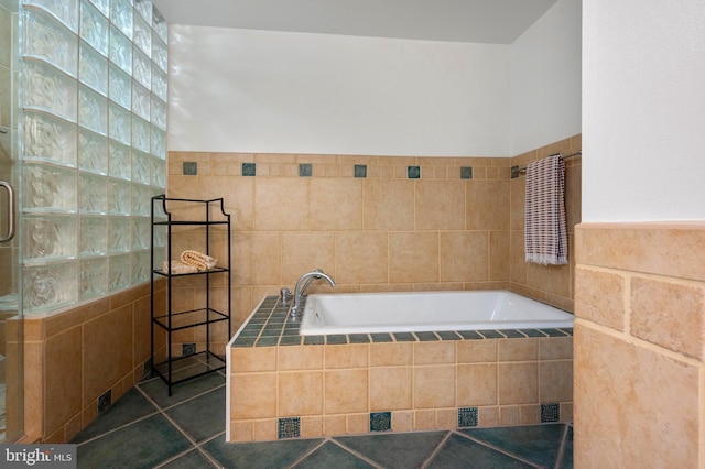 902 Emerald Dr, Alexandria, VA 22308 - full bath with tile walls, a tile shower, a garden tub, and tile patterned flooring