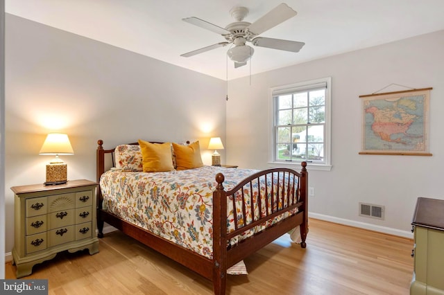 902 Emerald Dr, Alexandria, VA 22308 - bedroom with light wood-style flooring, baseboards, and ceiling fan
