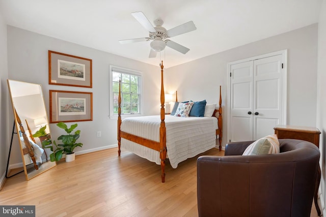 902 Emerald Dr, Alexandria, VA 22308 - bedroom with light wood finished floors, baseboards, a closet, and ceiling fan