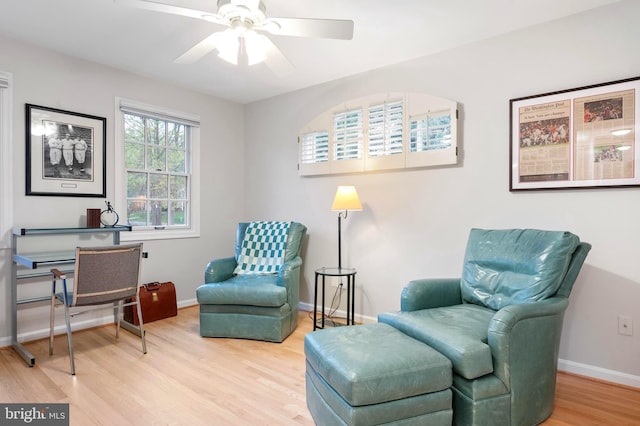 902 Emerald Dr, Alexandria, VA 22308 - living area featuring a ceiling fan, wood finished floors, and baseboards