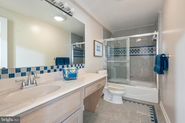 902 Emerald Dr, Alexandria, VA 22308 - full bath featuring tile patterned flooring, vanity, toilet, and combined bath / shower with glass door
