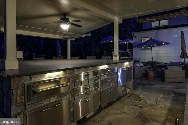 902 Emerald Dr, Alexandria, VA 22308 - view of patio with area for grilling and a ceiling fan