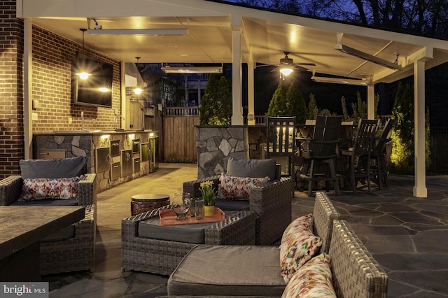 902 Emerald Dr, Alexandria, VA 22308 - view of patio featuring an outdoor hangout area, fence, a ceiling fan, an outdoor bar, and a gazebo