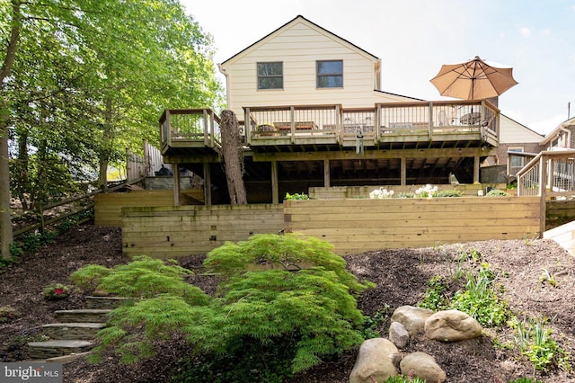 902 Emerald Dr, Alexandria, VA 22308 - back of property with a deck, fence, and stairs