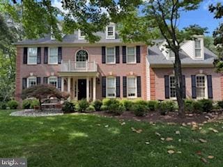 502 Pride Of Baltimore Dr, Arnold, MD 21012 - colonial home featuring a balcony and a front lawn
