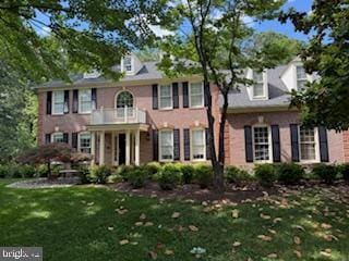 502 Pride Of Baltimore Dr, Arnold, MD 21012 - colonial house with a balcony and a front lawn