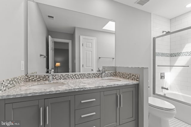 502 Pride Of Baltimore Dr, Arnold, MD 21012 - full bathroom with double vanity, toilet,  shower combination, and a skylight