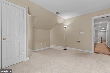 502 Pride Of Baltimore Dr, Arnold, MD 21012 - additional living space featuring carpet floors, baseboards, and lofted ceiling
