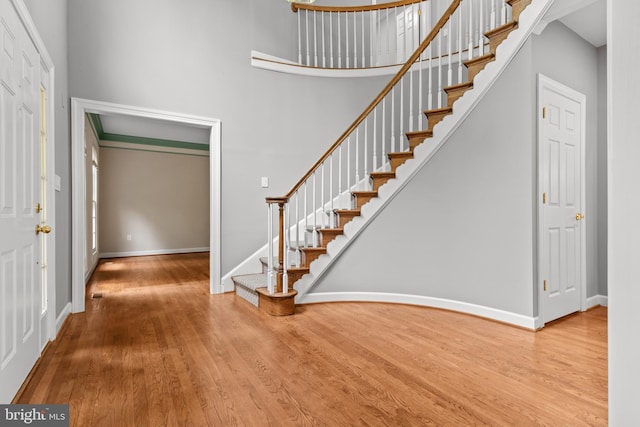 502 Pride Of Baltimore Dr, Arnold, MD 21012 - foyer featuring wood finished floors, stairs, baseboards, and a towering ceiling