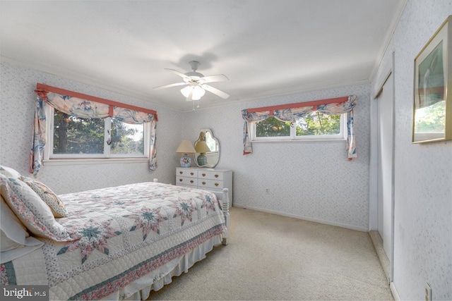 60 Holly, Long Beach Township, NJ 08008 - bedroom featuring multiple windows, carpet flooring, ornamental molding, ceiling fan, and wallpapered walls