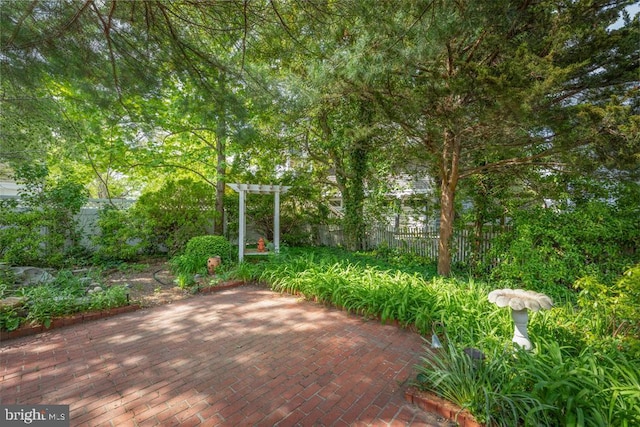 60 Holly, Long Beach Township, NJ 08008 - view of patio with a pergola and fence