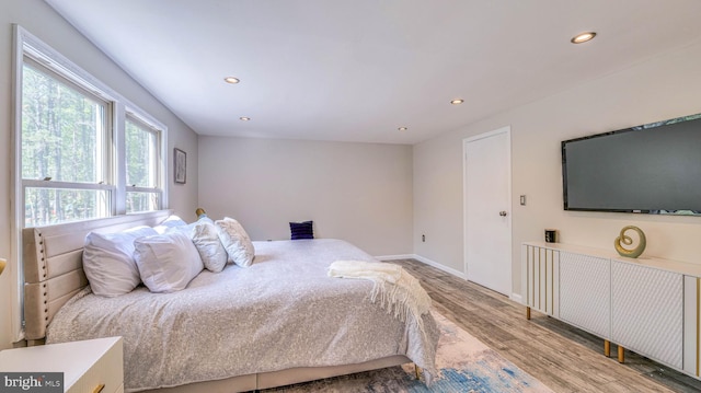 6057 English Creek Ave, Egg Harbor Township, NJ 08234 - bedroom with wood finished floors, recessed lighting, and baseboards