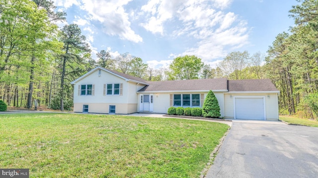 6057 English Creek Ave, Egg Harbor Township, NJ 08234 - split level home with driveway, an attached garage, and a front yard