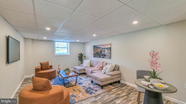 6057 English Creek Ave, Egg Harbor Township, NJ 08234 - living area featuring wood finished floors, baseboards, a paneled ceiling, and recessed lighting