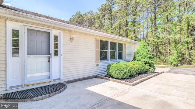 6057 English Creek Ave, Egg Harbor Township, NJ 08234 - view of exterior entry with a patio
