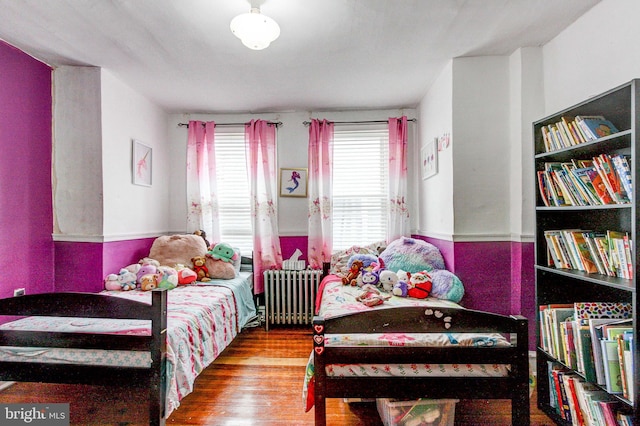 4527 Devereaux St, Philadelphia, PA 19135 - bedroom featuring radiator heating unit and wood finished floors