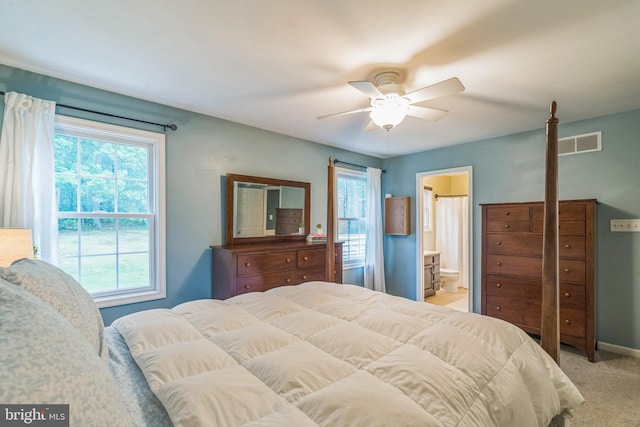 134 Whitaker Ave, North East, MD 21901 - bedroom with multiple windows, light colored carpet, a ceiling fan, and baseboards