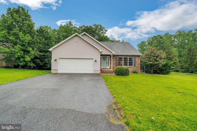 134 Whitaker Ave, North East, MD 21901 - single story home featuring asphalt driveway, a front lawn, an attached garage, and brick siding
