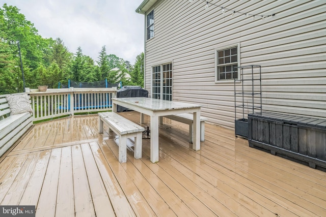 134 Whitaker Ave, North East, MD 21901 - deck with outdoor dining space, area for grilling, and view of wooded area