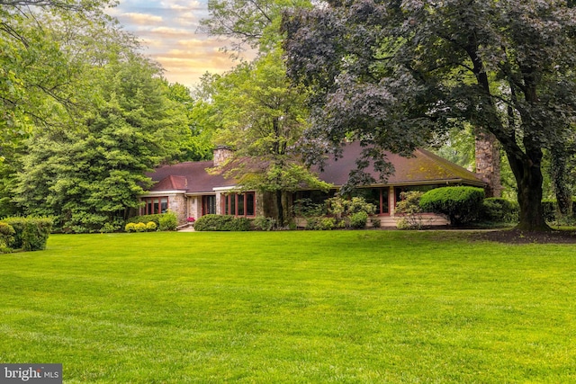 1255 Mill Rd, Jenkintown, PA 19046 - view of front of house with a yard and a chimney