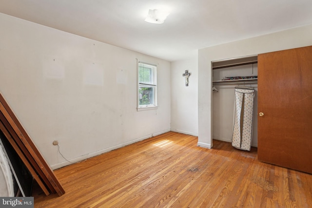 310 Passmore St, Philadelphia, PA 19111 - unfurnished bedroom with light wood-type flooring, a closet, and baseboards