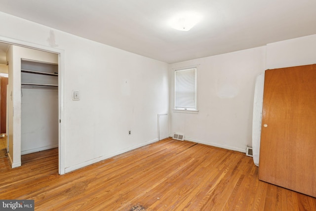 310 Passmore St, Philadelphia, PA 19111 - unfurnished bedroom featuring light wood-style floors, baseboards, and a closet