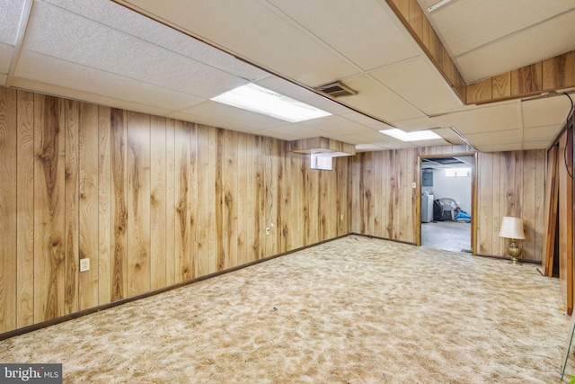 310 Passmore St, Philadelphia, PA 19111 - basement with a paneled ceiling, carpet, and wood walls