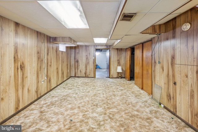 310 Passmore St, Philadelphia, PA 19111 - finished basement featuring wood walls, carpet flooring, baseboards, and a paneled ceiling