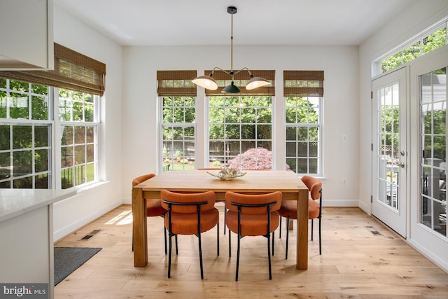 16340 Sandy Ridge Ct, Woodbridge, VA 22191 - dining area with light wood finished floors and baseboards