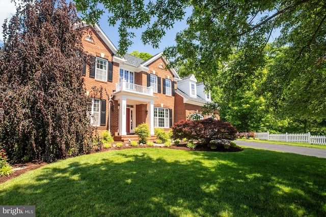 16340 Sandy Ridge Ct, Woodbridge, VA 22191 - colonial inspired home featuring brick siding and a balcony